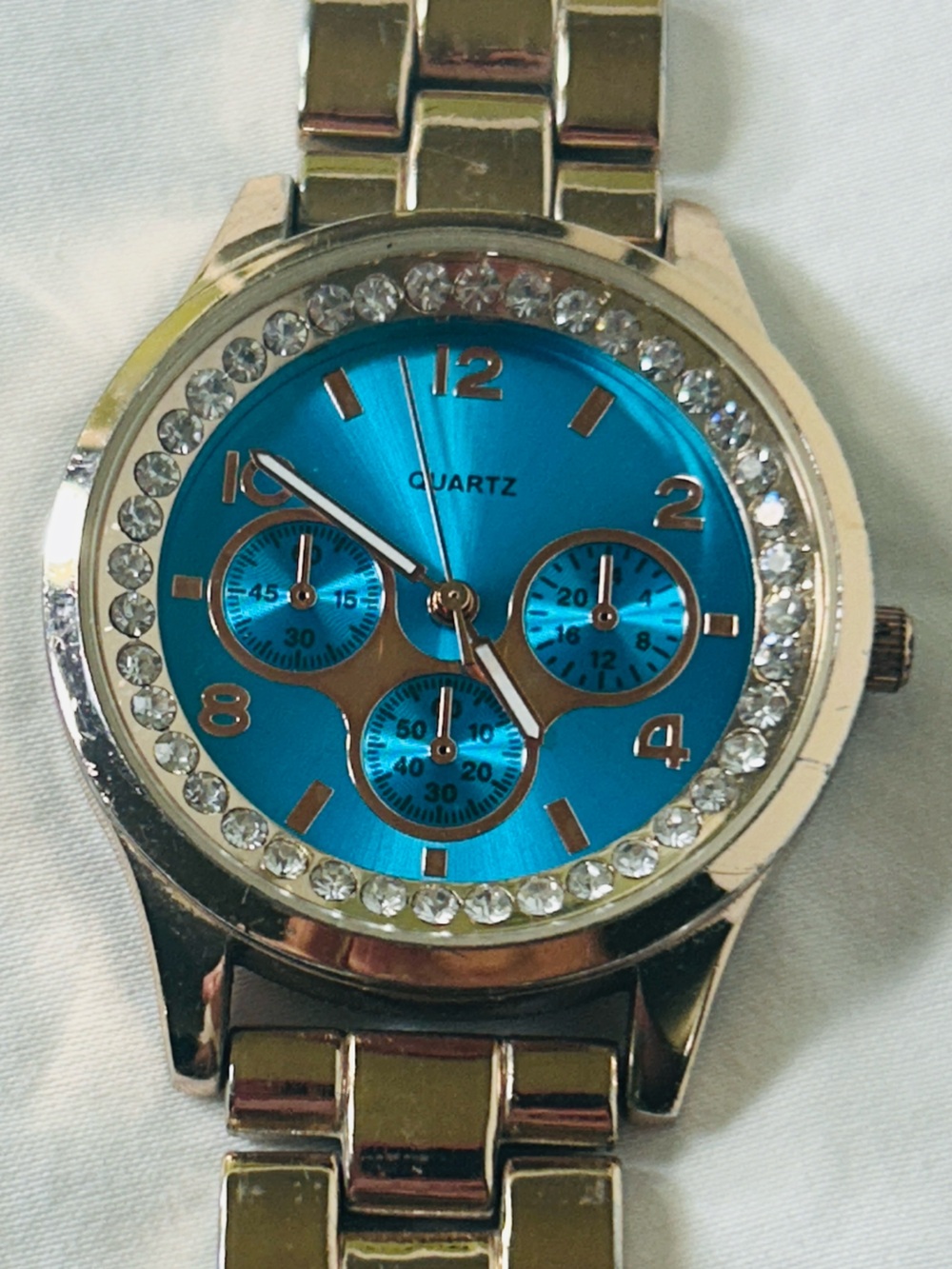 Women's Blue Crystal Accent Quartz Watch with Gold-Tone Bracelet
